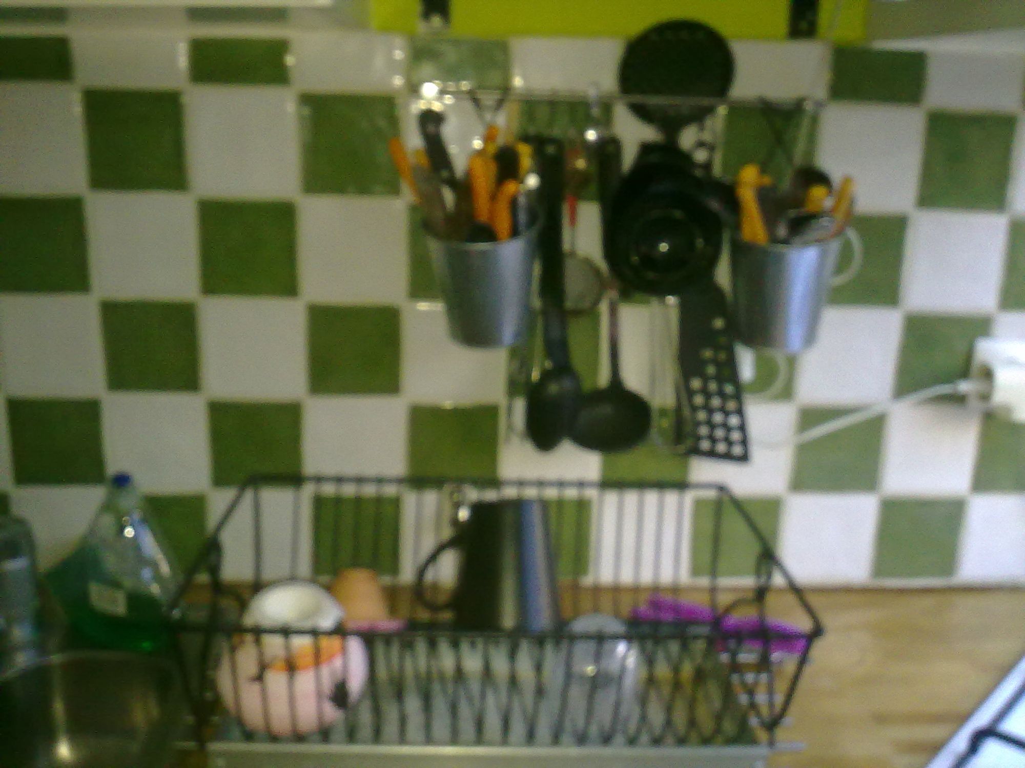 Old blurry photo of a kitchen