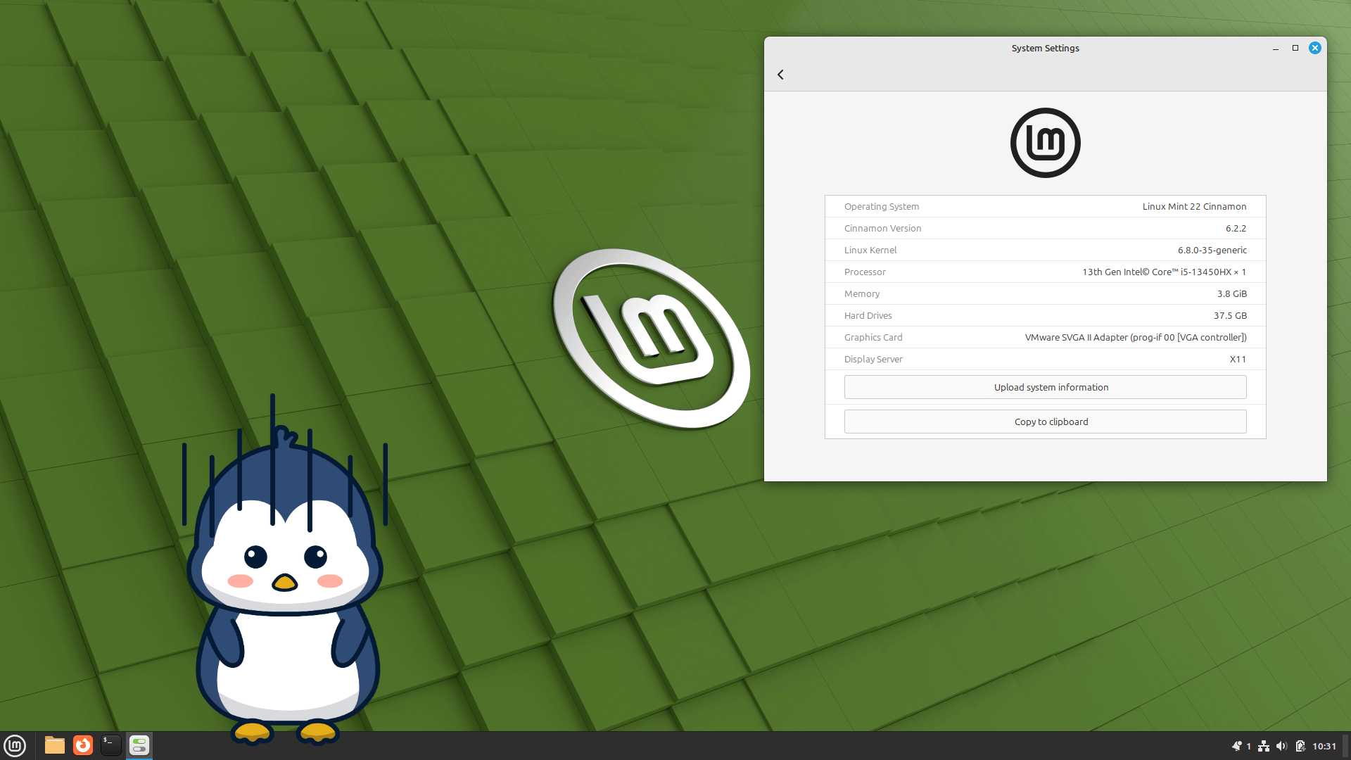 a screenshot of linux mint 22 beta release desktop view with system info and a sad tux graphic in it