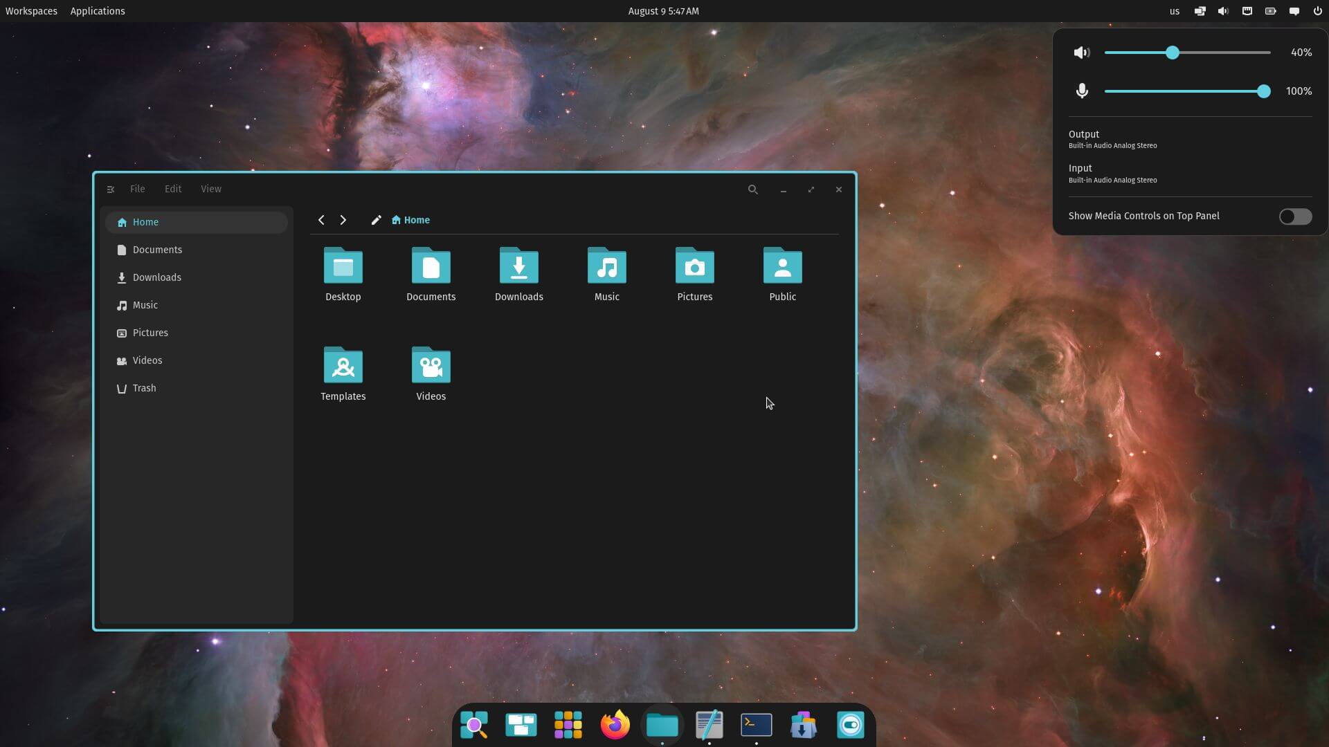 a screenshot of pop!_os 24.04 alpha cosmic desktop view with cosmic files and audio controls in top panel open