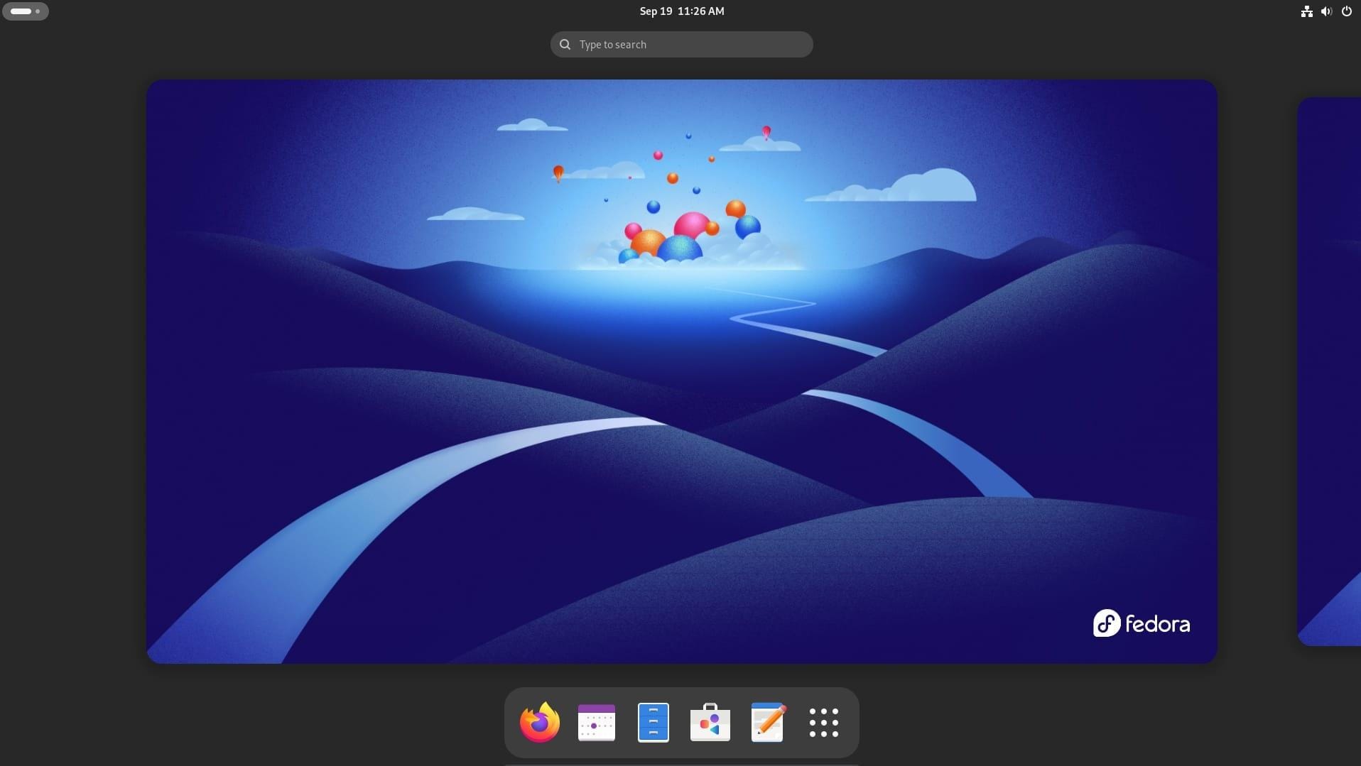 a screenshot of gnome 47 with some apps visible in the dock below and a blue colored fedora 41 wallpaper above