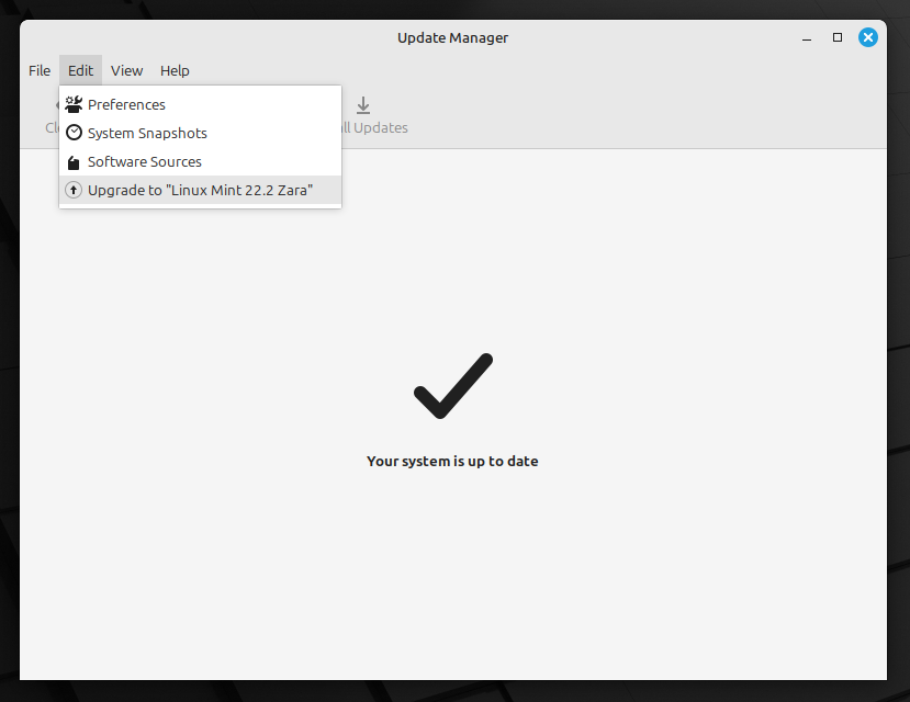 a screenshot that shows the update manager on linux mint 22.1 with the upgrade to "linux mint 22.2 zara" option in its edit menu