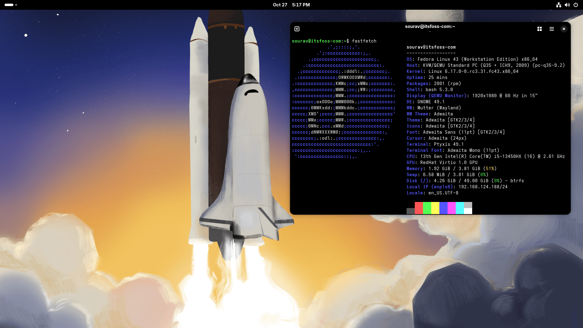 a fedora 43 workstation desktop view that shows the new spaceship wallpaper in the background and the fastfetch output on the right inside a terminal window