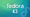 fedora 43 is written in white with blue shadow in the center, the background has a wavy green-blue mix pattern and the fedora logo faded on the right